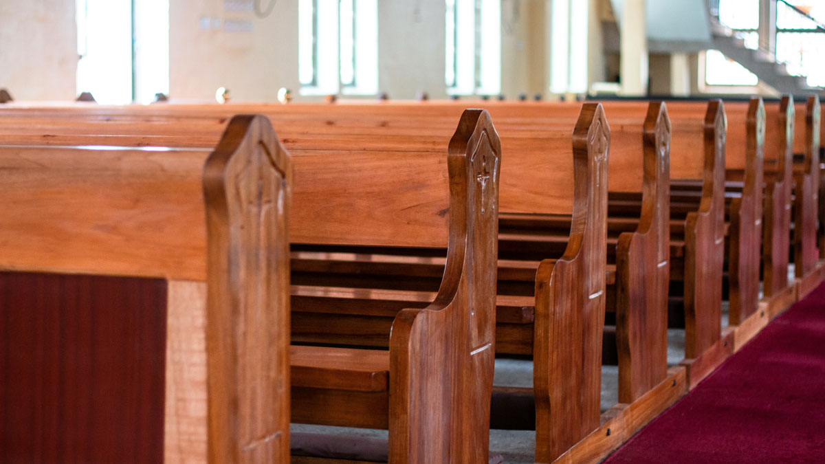 Rows of church pews.